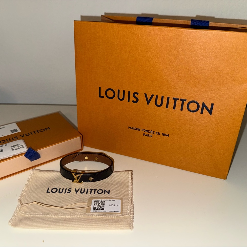 Louis Vuitton Black Leather Bracelet with Gold Emblem - Picture 11 of 15